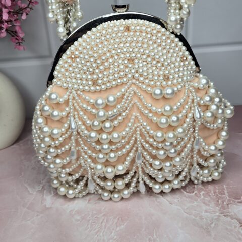 ✨ Royal Pearl Cascade Potli Bag ✨