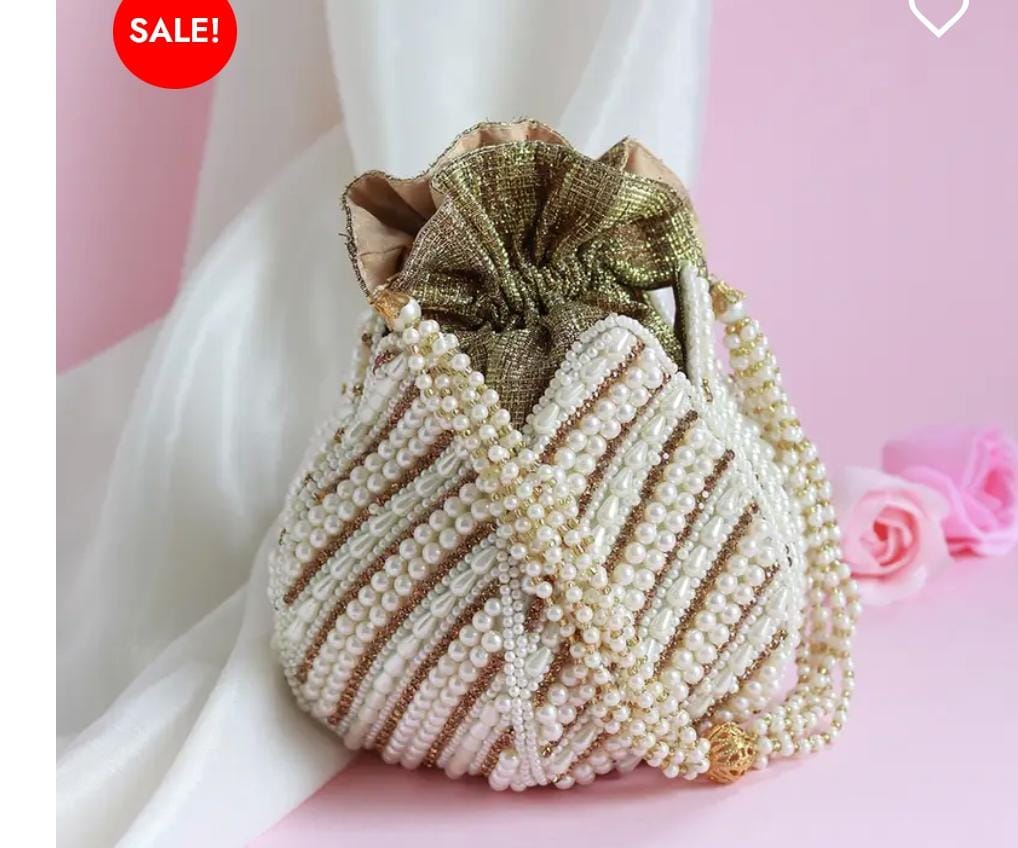🤍 Classic Pearl Elegance Potli Bag 🤍